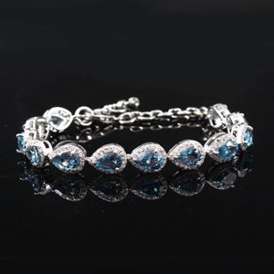 Blue Topaz Bracelet: Pear-Cut Gemstone, 925 Sterling Silver