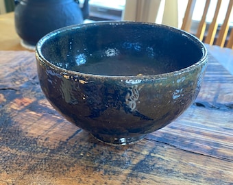 wood-fired stoneware pottery bowl with tenmoku glaze