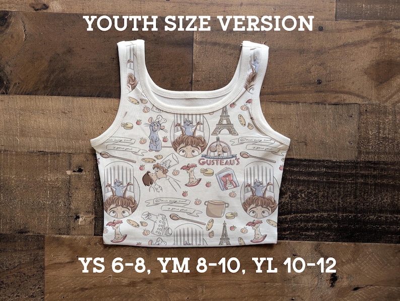 May include: White youth-size tank top with a repeating pattern of cartoon characters, food, and the Eiffel Tower. The text "GUSTEAU'S" is visible. Sizes YS 6-8, YM 8-10, and YL 10-12 are listed.