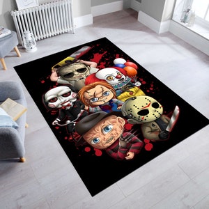 May include: Black and red rug with a graphic print of various horror movie characters, including Freddy Krueger, Jason Voorhees, and Chucky. The characters are depicted in a cartoon style and are holding various weapons.