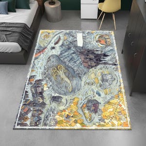 May include: Rectangular area rug with a detailed map design. The rug features a white border and a central illustration of a fantasy landscape with buildings, a lake, and a large sea creature. The color palette includes blues, grays, and yellows.