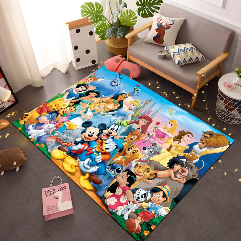 May include: A colorful rug featuring various Disney characters including Mickey Mouse, Minnie Mouse, Donald Duck, Goofy, Winnie the Pooh, Tigger, Cinderella, Belle, Ariel, and more. The rug has a blue background with a light blue border.
