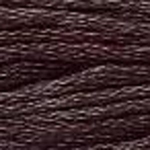 May include: Close-up of a dark brown textured fabric with a subtle woven pattern.