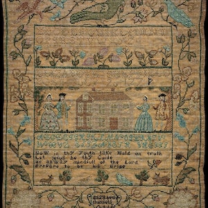 May include: Antique sampler textile featuring cross-stitch embroidery. The piece depicts a house, figures, birds, and floral motifs, with text including the name "Elizabeth Sheffield" and the date "October 1784". The color palette includes beige, green, and blue.