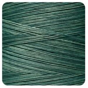 May include: A spool of teal green thread.