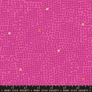 May include: Pink fabric with a repeating pattern of small squares in a mosaic design. The squares are mostly pink with a few yellow and orange squares scattered throughout.