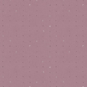 May include: A seamless pattern of small white circles on a dusty rose background.