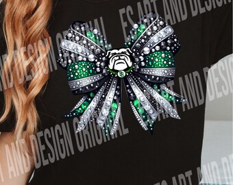 May include: Black t-shirt with a green, white, and silver sparkly bow with a bulldog mascot in the center. The bulldog is wearing a green and white hat with the letter "B" on it.