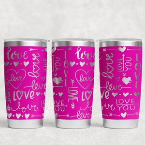 May include: Three stainless steel tumblers with a pink base and silver lettering. The tumblers are decorated with a repeating pattern of hearts and the words "love" and "I love you".
