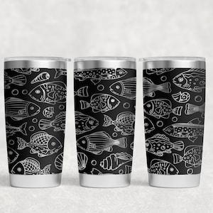 May include: Three stainless steel tumblers with a black and white design of various fish and seashells.