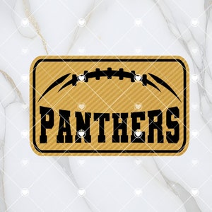 Può includere: Un cartello dorato e nero con una grafica di un pallone da calcio e il testo "PANTHERS".