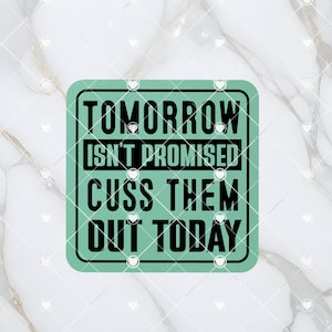 May include: A square, mint-green sign with black text that reads "TOMORROW ISN'T PROMISED CUSS THEM OUT TODAY." The sign is set against a white and gray marble-patterned background.