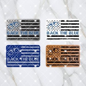 May include: Four different versions of a "Back the Blue" design. Each design features a distressed American flag with handcuffs and the text "Back the Blue". The flags are in gray, white, blue, and brown.