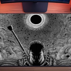 May include: Black and white rectangular mousepad featuring a detailed illustration of a character with a large sword, surrounded by faces and a dark circular design. The artwork has a manga style.