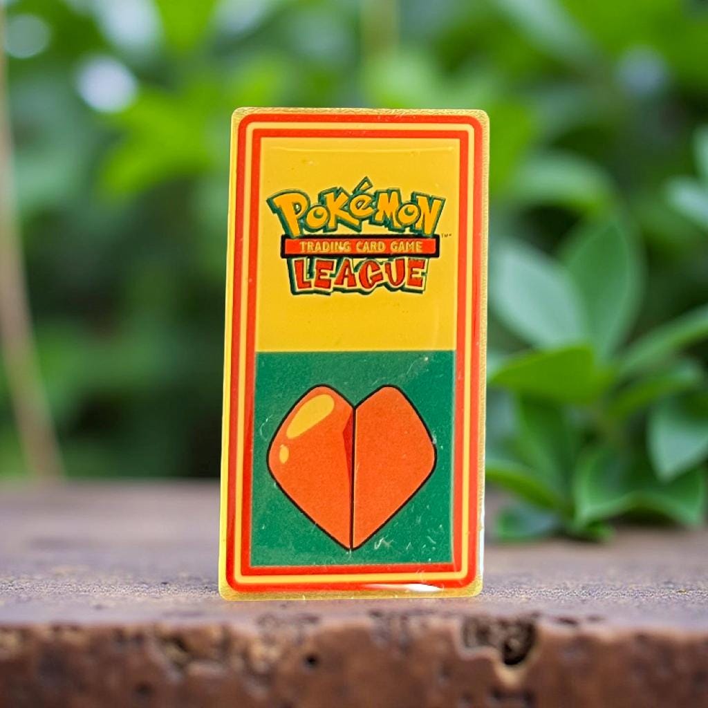 pokemon trading card game league pins Thunder Badge Corn Coast Comics Youll also receive a pin with the Dragon 1 Vintage Pokmon League Pin