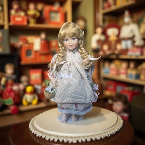 Avon Sarah Rose Porcelain Doll (2000) – Elegant & Collectible