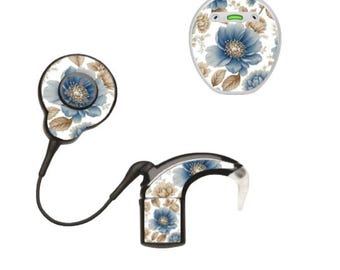 May include: Three hearing aid devices with a floral design. The devices feature a pattern of blue and tan flowers on a white background. One device is circular, another is a curved shape, and the third has a circular component connected by a wire.