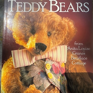 May include: A book cover titled "Making Adorable Teddy Bears" features a close-up of a brown teddy bear with a striped bow tie and a floral vest. The bear has a black nose and button eyes. The book is from Anita Louise Crane's Bearlace Cottage.