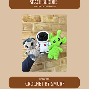 May include: A crochet pattern for three space-themed toys: an astronaut, an alien, and a space creature. The toys are in white, green, and gray. The text on the image says "SPACE BUDDIES" and "3-IN-1 PDF CROCHET PATTERN". The designer is "CROCHET BY SMURF".