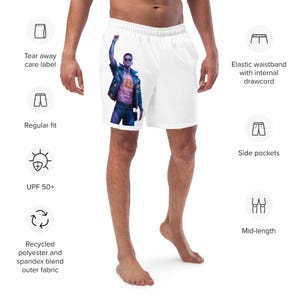 May include: White swim trunks with a graphic print of a man wearing a leather jacket and holding a fist in the air. The swim trunks have an elastic waistband with an internal drawstring, side pockets, and a mid-length fit. The fabric is made from recycled polyester and spandex blend.
