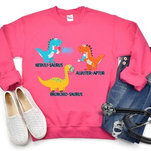 Grappig sweatshirt voor ademhalingstherapeut, shirt dinosaurus pediatrische ademhalingstherapie, aangepast shirt voor kinderarts en verpleegster, PICU RRT ronde hals Heliconia