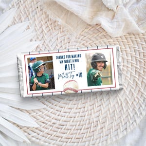May include: A baseball-themed chocolate bar wrapper featuring two photos, a baseball graphic, and the text "THANKS FOR MAKING MY NIGHT A BIG HIT!" and "Matt Troy #16" on a white background with red and blue accents.