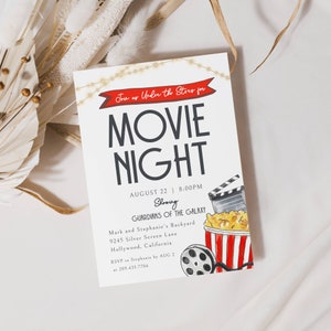 Movie Night Invitation. Join us Under the Stars. Watercolor Popcorn Tub, film roll and Clapper. Red Banner and Twinkly lights. Dark Gray Fonts and White Background. Print or send digitally. 5x7.