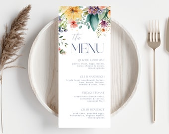 May include: A menu with a floral border featuring a watercolor design of yellow, pink, and purple flowers. The menu lists the following items: Quiche Lorraine, Club Sandwich, French Toast, and Crab Benedict.