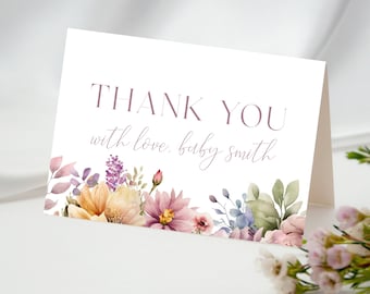May include: Thank you card with a floral design in shades of purple, pink, and yellow. The text reads "Thank you with love, baby Smith."