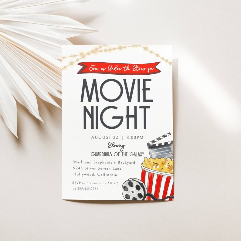 Movie Night Invitation. Join us Under the Stars. Watercolor Popcorn Tub, film roll and Clapper. Red Banner and Twinkly lights. Dark Gray Fonts and White Background. Print or send digitally. 5x7.