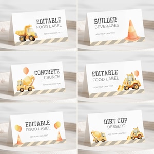 May include: Set of six white cardstock food labels with construction-themed illustrations. Each label features a different design, including a dump truck, traffic cone, and cement mixer. Text includes "Editable Food Label", "Builder Beverages", "Concrete Crunch", and "Dirt Cup Dessert".