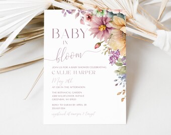 May include: A floral baby shower invitation with a watercolor design featuring pink, purple, and yellow flowers. The text reads "Baby in Bloom" and includes the name "Callie Harper", the date "May 20th", and the time "1:30 in the afternoon".