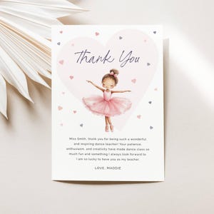 May include: A thank you card featuring a ballerina in a pink tutu, with the words "Thank You" above. The card has a message for a dance teacher and is decorated with pink and blue hearts. The card is a lovely gesture.
