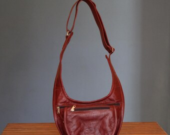 Crossbodytas met meerdere zakken, leren crossbodytas, verborgen schoudertas, verstelbare schouderriem, veilige dames- en herentas.