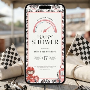 May include: A smartphone displays a baby shower invitation with a race car theme. The invitation features a speedometer, checkered flags, and a cartoon race car driver. The text reads "Baby Shower" and includes event details.