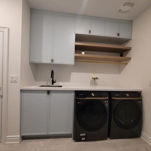 Customized Mud Room,  Kitchen Cabinets, Floating Oak Shelves, Customized Quartz & Corian (solid surface) countertop Custom Kitchen Cabinetry