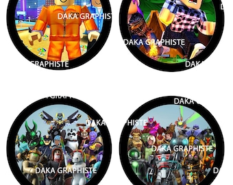 May include: Four circular stickers with black borders. Each sticker features a different colorful illustration of characters from a video game. The text "DAKA GRAPHISTE" is printed on each sticker.
