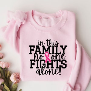 In This Family No one Fights Alone Shirt, Cancer Awareness Shirt, Pink Day Shirt, Cancer Fighter Shirt, Pink Day Sweatshirt, Cancer Warrior
