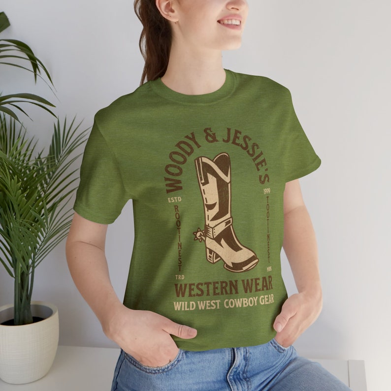Toy Story Shirt - Woody and Jessies Western Wear Unisex Light Weight Jersey Short Sleeve Tee - Woodys Round Up - Rootinest Tootinest Cowboy Heather Green