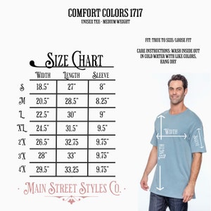May include: Size chart for a unisex t-shirt with measurements in inches for width, length, and sleeve. The chart shows sizes from S to 4X. The image also shows a model wearing a light blue t-shirt.