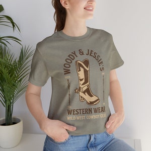 Toy Story Shirt - Woody and Jessies Western Wear Unisex Light Weight Jersey Short Sleeve Tee - Woodys Round Up - Rootinest Tootinest Cowboy Heather Stone