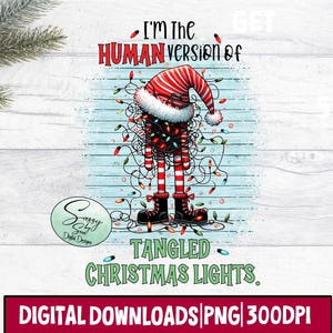 May include: A whimsical digital design featuring a figure with a Santa hat and legs wrapped in tangled Christmas lights. The text reads "I'm the HUMAN VERSION of TANGLED CHRISTMAS LIGHTS." The design includes the text "DIGITAL DOWNLOADS | PNG | 300DPI."