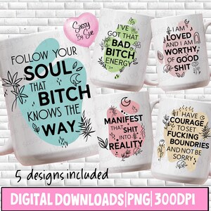 May include: A collection of white ceramic mugs featuring empowering slogans in black, teal, pink, and green. Phrases include "Follow Your Soul That Bitch Knows The Way" and "I've Got That Bad Bitch Energy". Floral and abstract designs decorate the mugs.