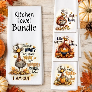 May include: A set of four white kitchen towels featuring colorful turkey illustrations and text. The designs include phrases like Kitchen Towel Bundle, Whisk taker, Life happens Pie helps, and They do WHAT? They stuff WHAT into WHERE? OH HELL NO... I AM OUT.