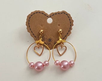 Gold colored elegant pretty cute coquette hoop earrings studs with dangly heart charm pink pearl beads