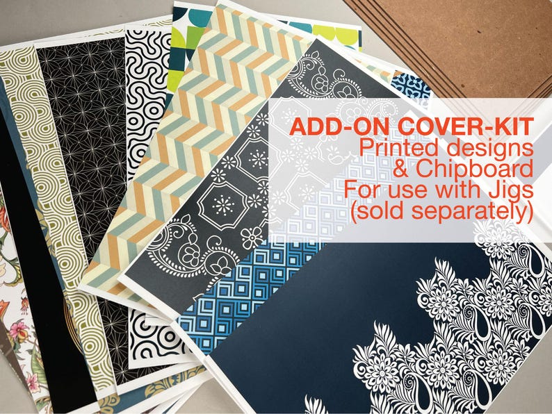 May include: A collection of patterned paper sheets with various designs, including geometric, floral, and abstract patterns. The text "ADD-ON COVER-KIT Printed designs & Chipboard For use with Jigs (sold separately)" is visible. The papers are in shades of blue, beige, black, and white.