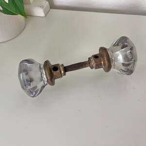 Coppia di pomelli per porte in vetro e ottone