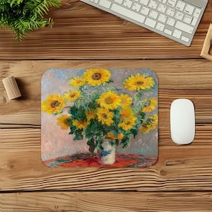 May include: A rectangular mousepad featuring a painting of sunflowers in a vase. The sunflowers are yellow with green leaves, and the vase is white with blue accents. The background is a mix of red, pink, and blue.