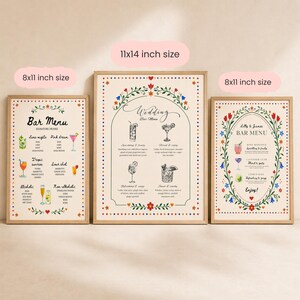 Whimsical floral wedding bar menu sign with colorful folk art border and illustrated drinks, editable Canva template displayed on easel and table settings