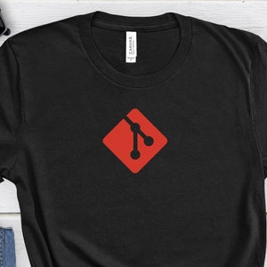 May include: Black t-shirt with a red diamond-shaped logo featuring a stylized branching symbol. The logo is the Git version control system icon.